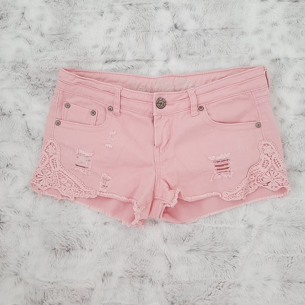 Vanilla Star pink distressed crochet lace jean shorts.  Size 7.